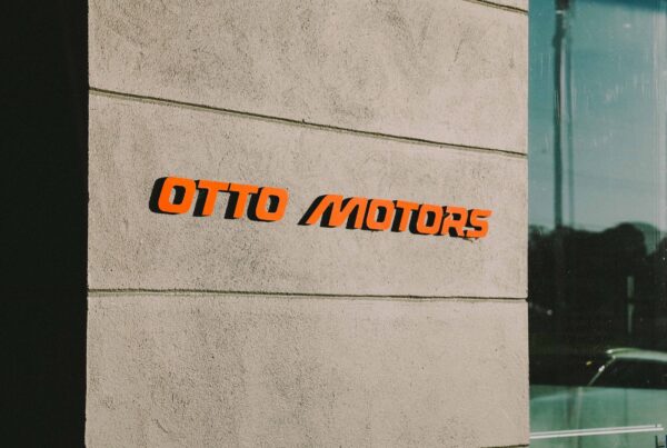 OTTO Motors orange lettering on the building facade
